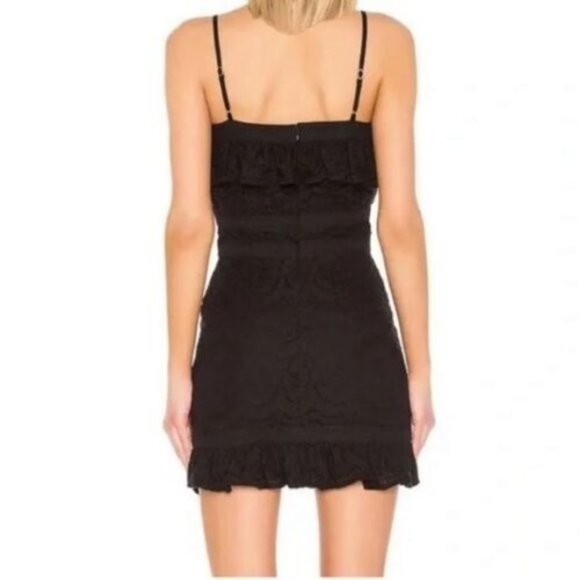 Fully lined Adjustable straps Embroidered eyelet fabric Ruffled trim Hidden back - Picture 3 of 10